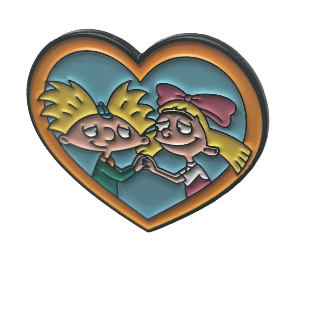 Hey Arnold enamel pin featuring Arnold and Helga holding hands inside a heart design