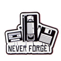 Never Forget enamel pin with VHS tape cassette tape and floppy disk retro 90s nostalgia design
