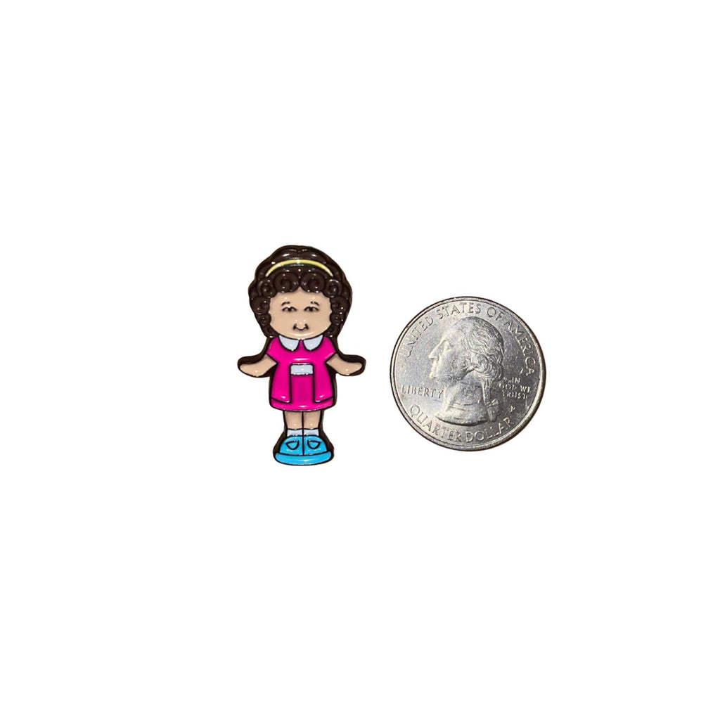Polly Pocket enamel pin inspired by the 90s miniature doll toy with classic retro design