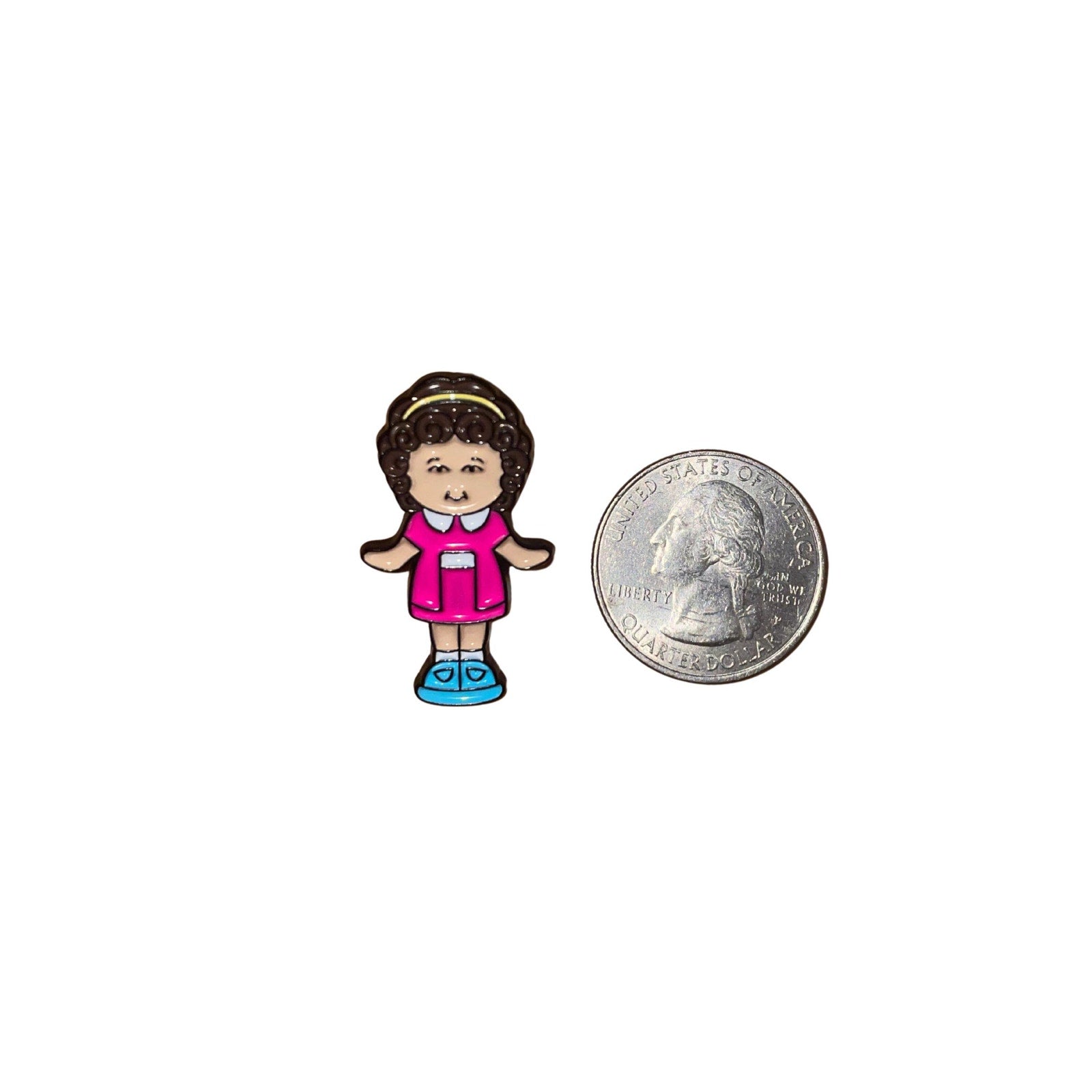 Polly Pocket enamel pin inspired by the 90s miniature doll toy with classic retro design