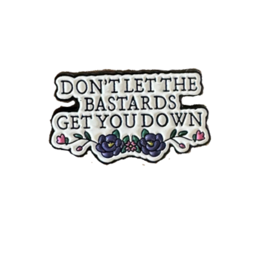 Don’t Let the Bastards Get You Down enamel pin inspired by The Handmaid’s Tale quote